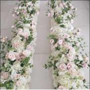 Flower Arrangements On Top Of Shelf