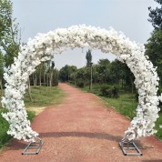 Wedding Arch With Flowers And Fabric