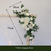 Decorating A Wedding Arch With Tulle And Lights