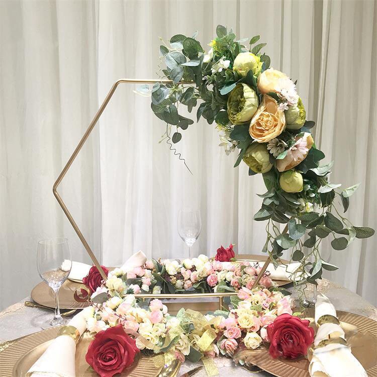 gold flower arrangements for wedding reception tables