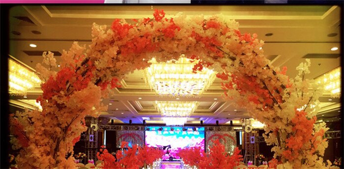 wedding arch with flowers and fabric3