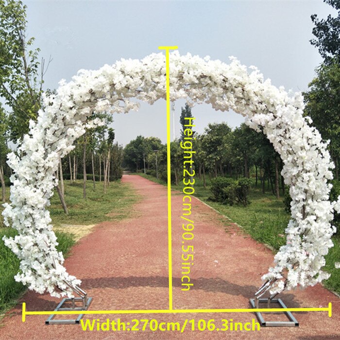 wedding arch with flowers and fabric1