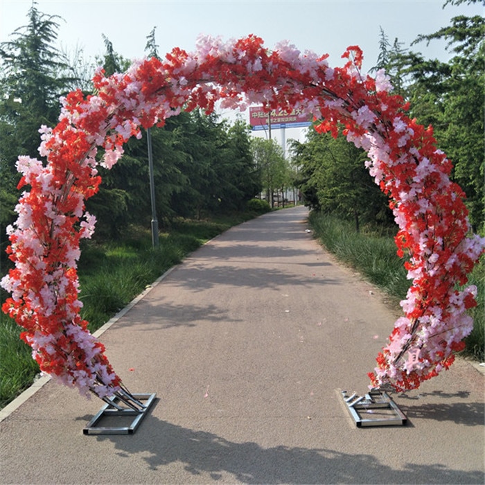 wedding arch with flowers and fabric8