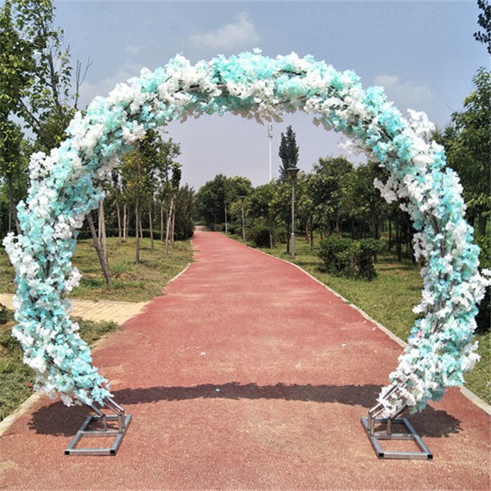 wedding arch with flowers and fabric4