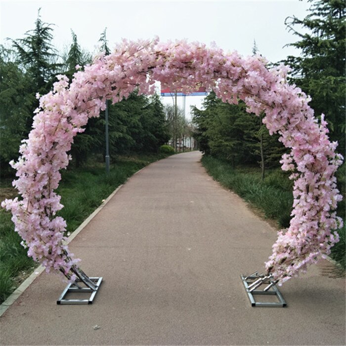 wedding arch with flowers and fabric9