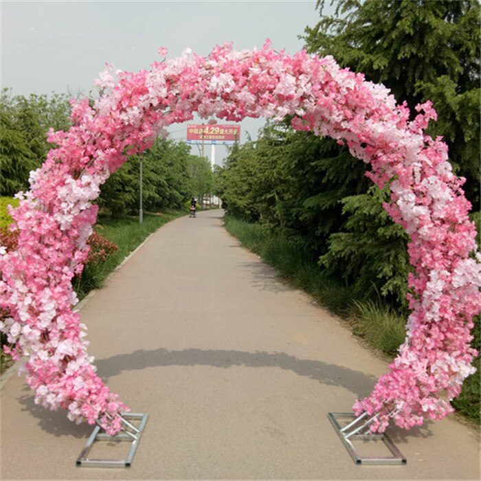 wedding arch with flowers and fabric7